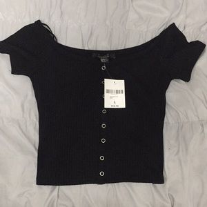 Off the shoulder shirt.